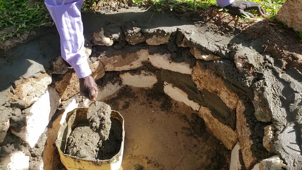 Building a Wall To Keep The Coconut Roots Out